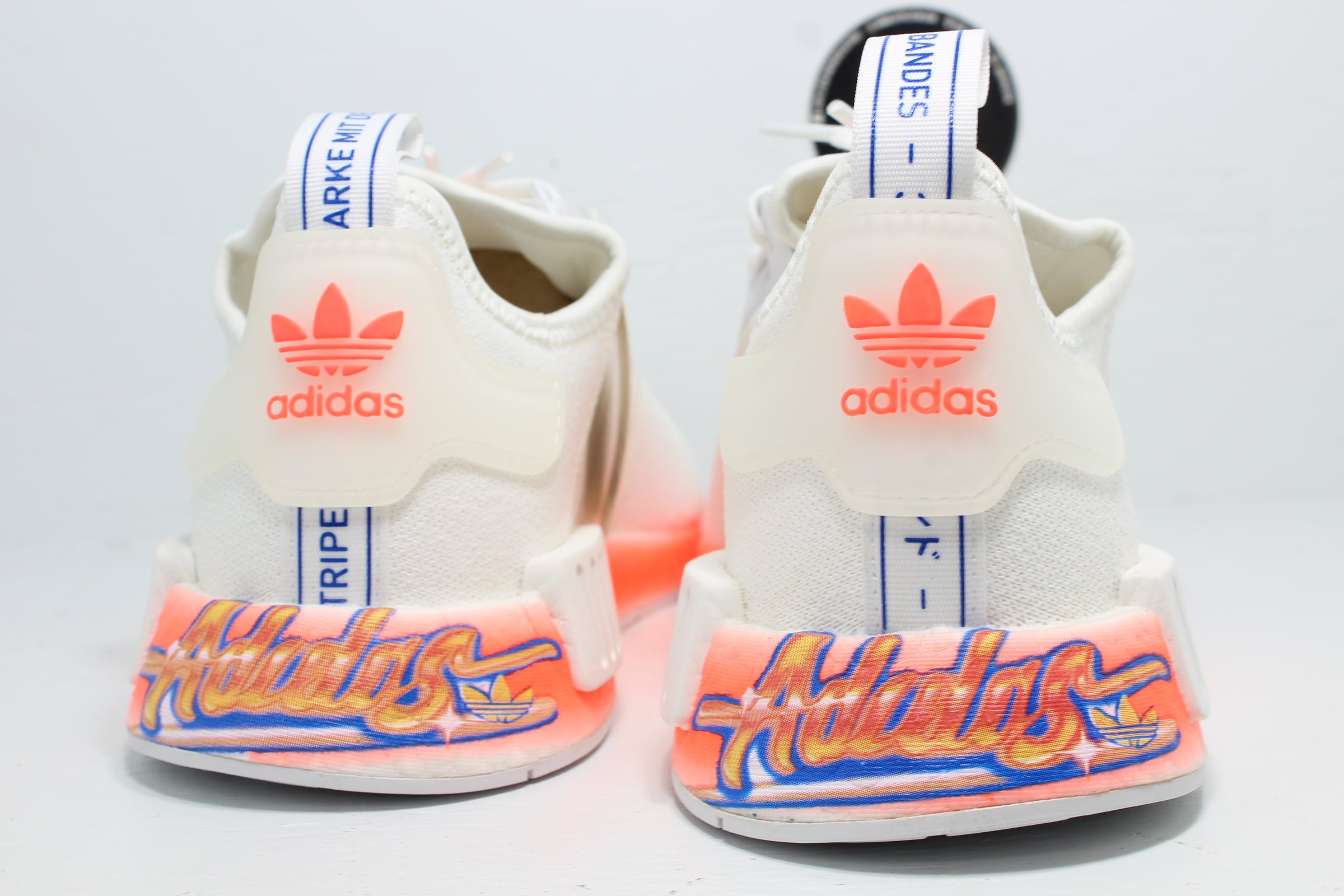 Adidas NMD_R1 Cloud White Orange Hype Stew Sneakers Detroit Adidas NMD_R1 Cloud White Orange Hype Stew Sneakers Detroit